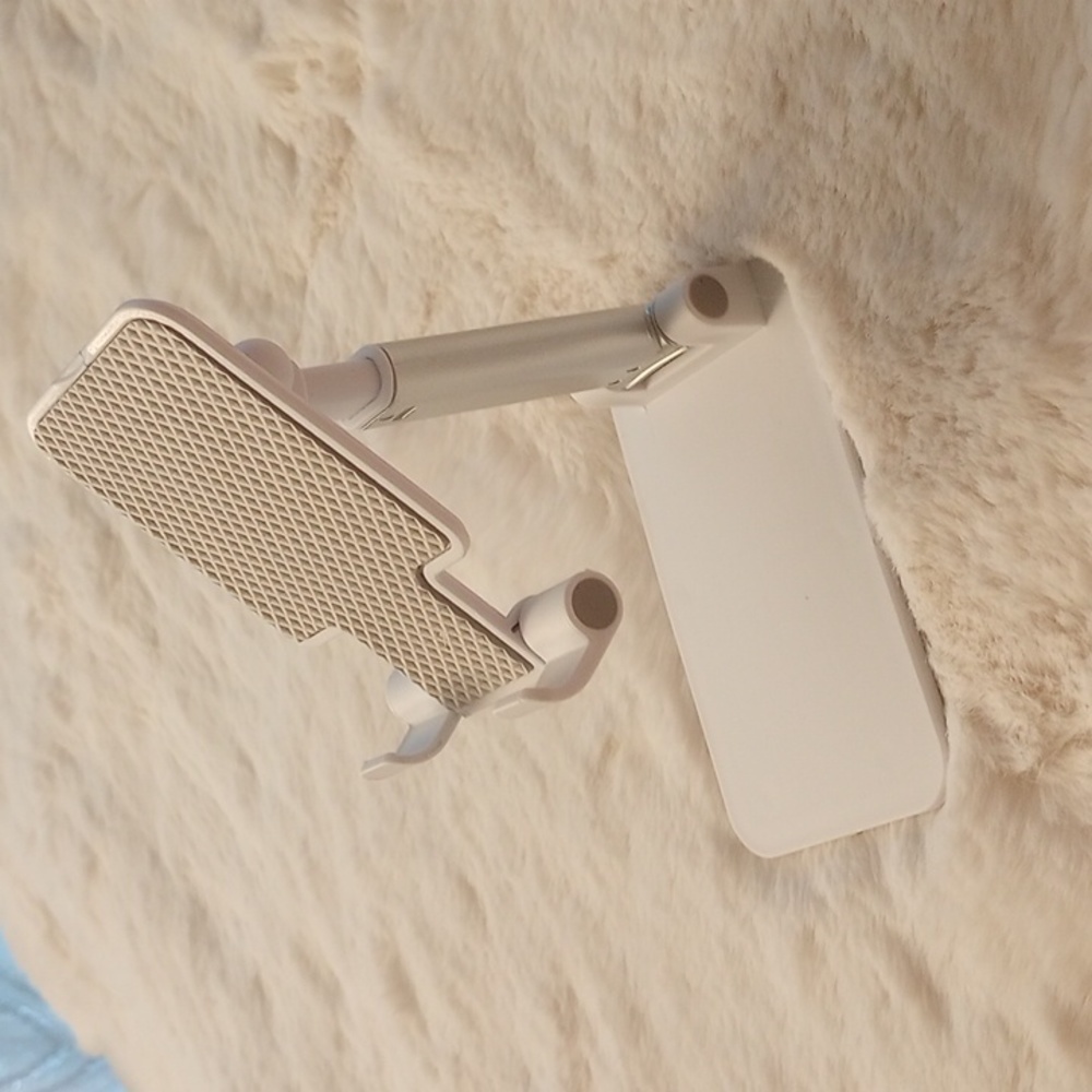 White sturdy adjustable and collapsible phone holders